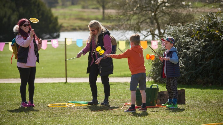 A family enjoying the Easter Trail at Clumber Park
